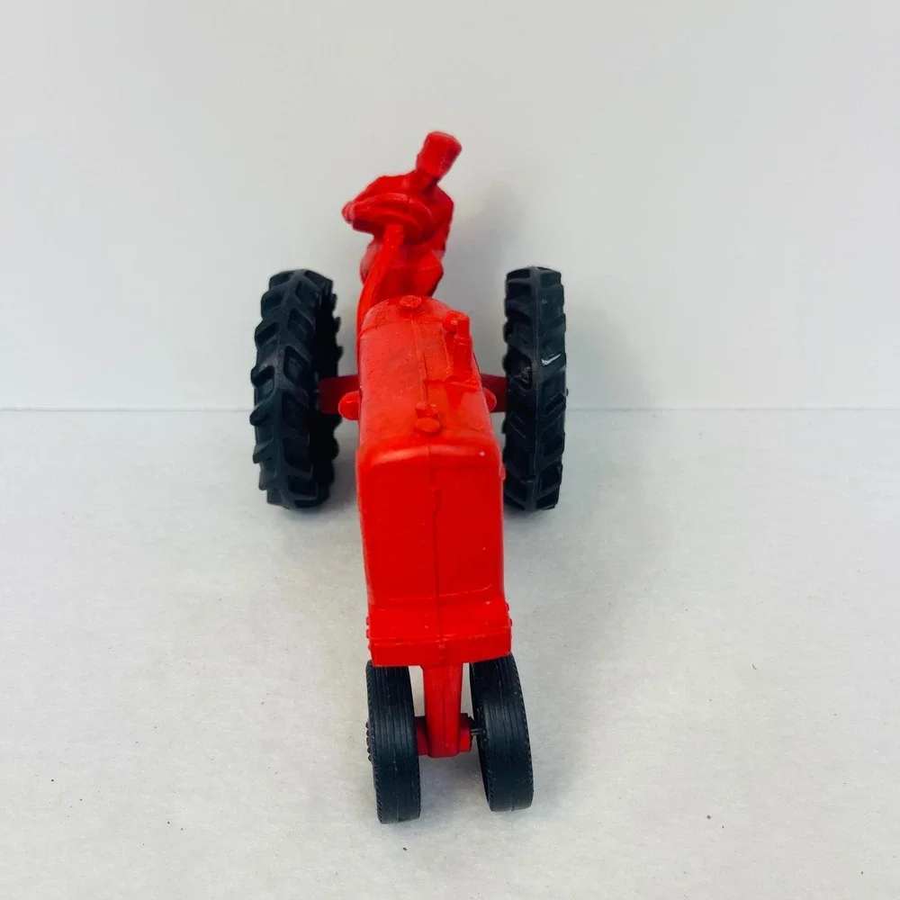 Vintage Auburn Rubber Red Tractor Toy with Driver Figure Black Wheels 7.5 Inch